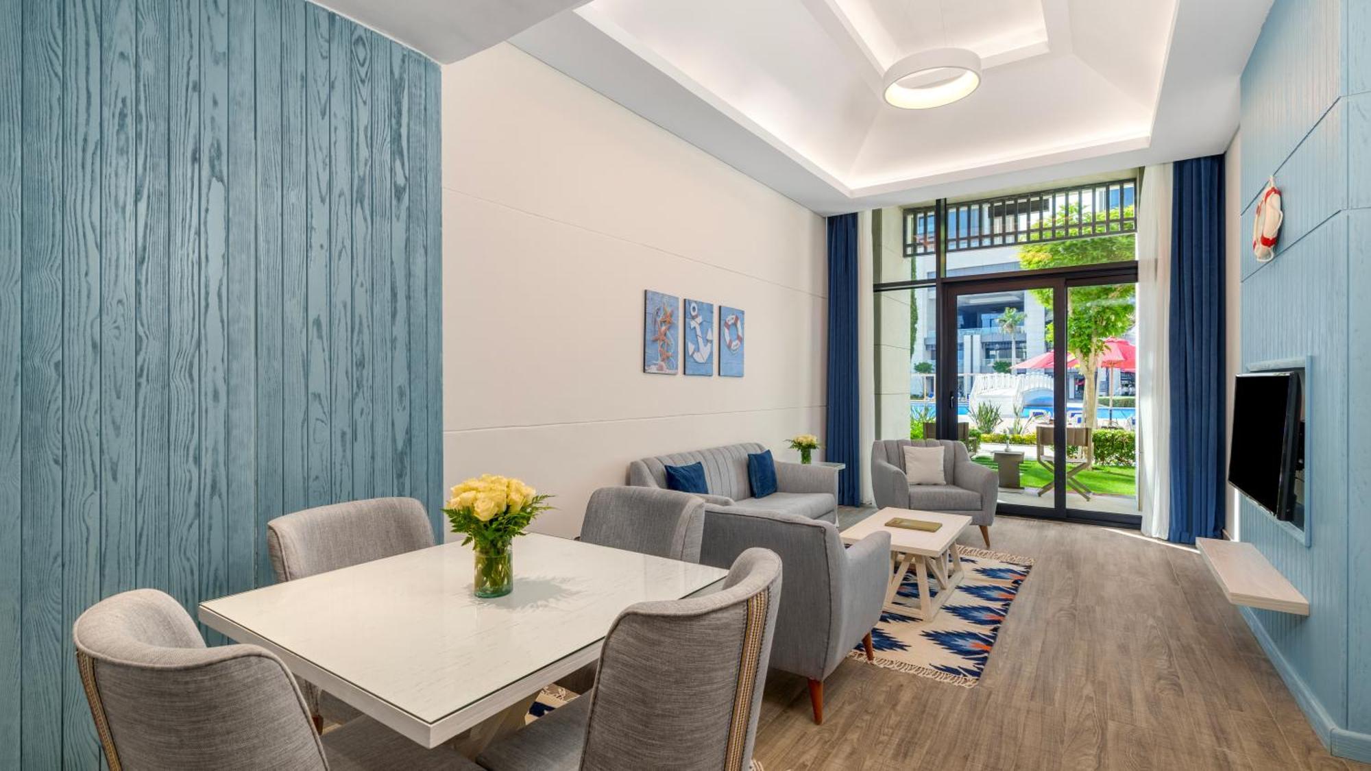 Rixos Premium Alamein El Alamein Phòng bức ảnh A staged living room